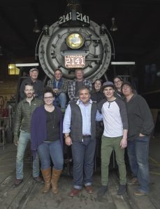 The Arc/k Project and Kamloops Heritage Railway Association in front of the 19th century Canadian National Railway steam locomotive 2141, in Kamloops, Canada photo