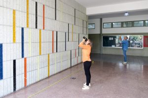 Photographer in the field capturing a mural as part of our Preserving Venezuelan Culture Digitally — Initiative: Venezuela photo